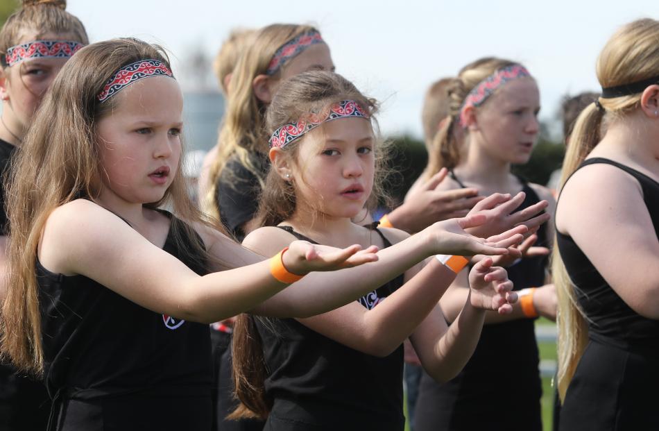 Sophie Roberts (left) and Jasmine Knight both 10, present with the Oxford Area School Kapa Haka...