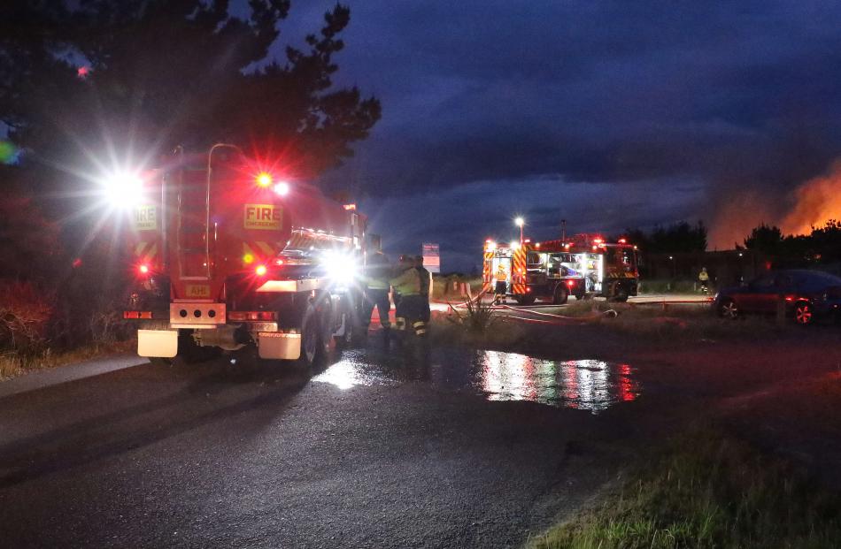 FENZ fire engines and water tankers at the Pegasus Beach assembly area last night. PHOTO: JOHN...