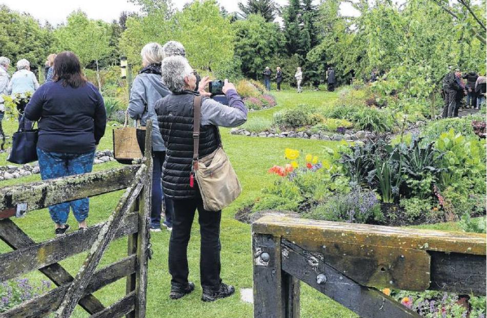 Fabulous gardens . . . Cars and bus loads of visitors from Auckland to Invercargill marvel at the...