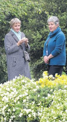 Interesting chat . . . Pat Austin of Fendalton, left, chats with owner Juliet Hunter at the...