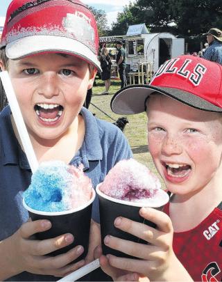 Cooling down . . . Thomas Banks (left) of Omihi and William Hoban of Waipara, both aged 8, looked...