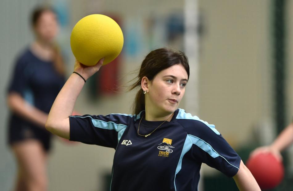 Tahlia Mortimer (14), of Taieri College, prepares to fire at an opponent in dodgeball.