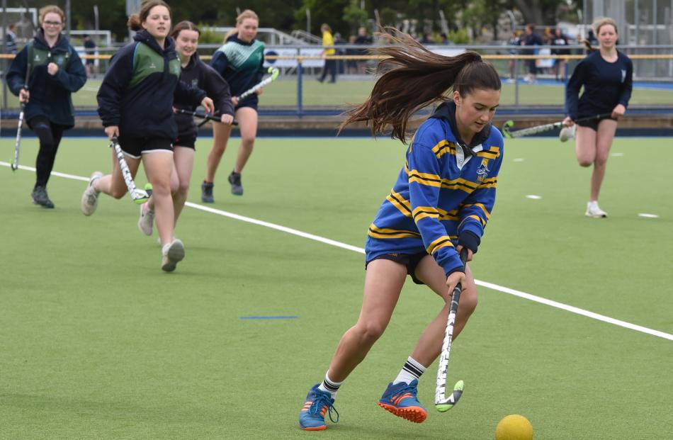 Taieri College pupil Bella MacKenzie (15) flies down the McMillan Centre turf during a game of ...