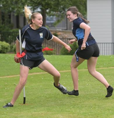 Jess McKercher (14), of Roxburgh Area School, touches the marker in front of St Hilda’s pupil...