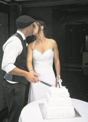 Sam and Tania Jenkins cut their wedding cake.
ASPIRING PHOTOGRAPHY