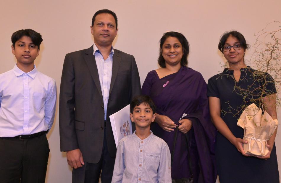 Indu Peiris,  his wife Samanthi Ekanayake and their children (from left) Nevin (14), Nisal (5)...