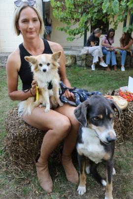 Biding their time  . . . Waiting their turn at the Bark Up, were Rev and Mouse with owner Larissa...