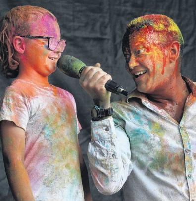 Winner . . . Ashton Jory, aged 7, of Woodend, is interviewed by festival emcee Dave Greensmith...