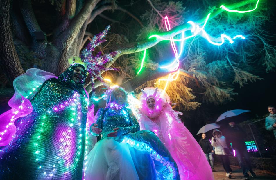 Queenstown locals dressed as a sea cucumber and mermaids light up around Luma in the Queenstown...