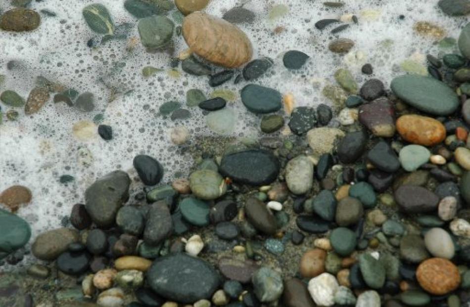 There are hours of fossicking to be had at Gemstone Beach, Western Southland.