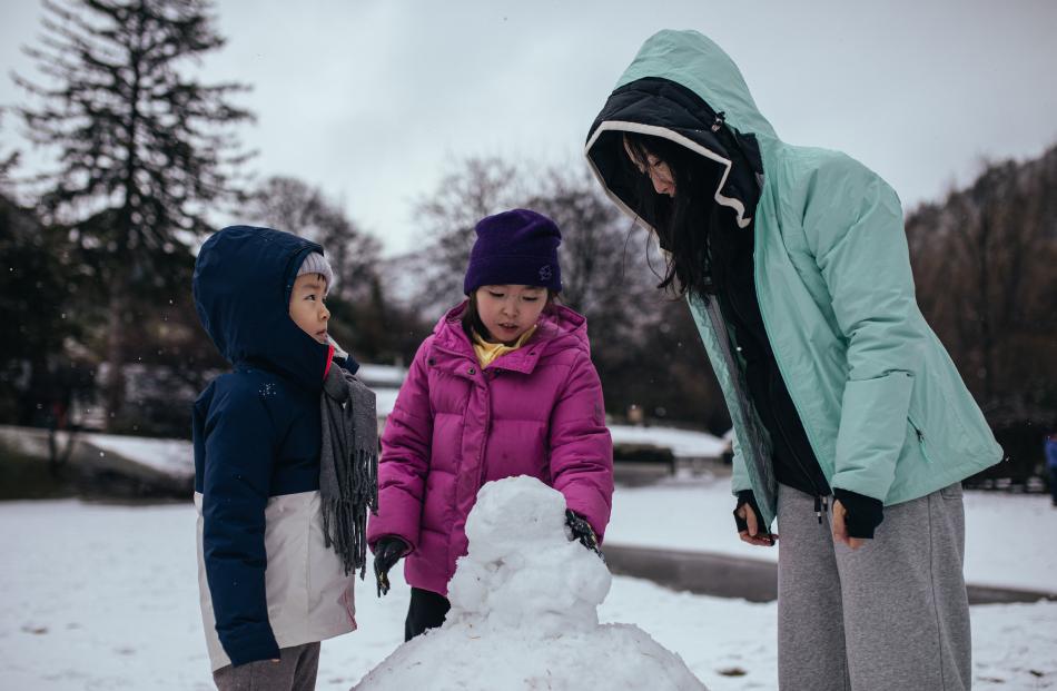 Zun Yan (6), Yulng Ding (10) and Ye Hong are visiting from China, and put in a team effort to...