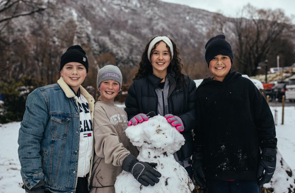 Reuben Moffett (13), Edie Moffett (10), Ella Carter (13) and Charlie Carter (13) poses in front...