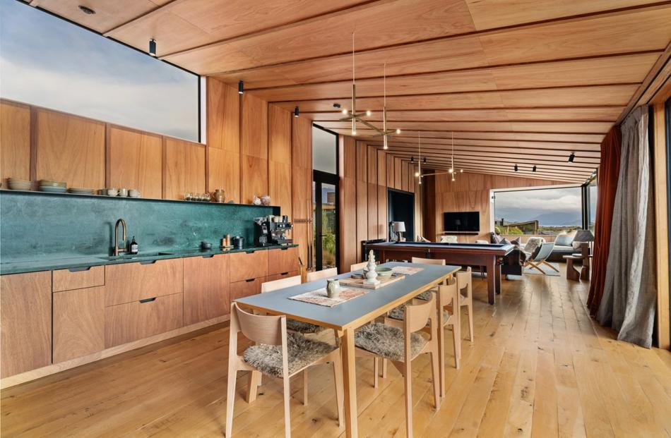 Battens add texture to the walls and ceiling of the living area.