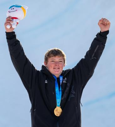 Luke Harrold, of Lake Hāwea, celebrates winning the Freestyle Skiing Men’s Freeski Halfpipe.