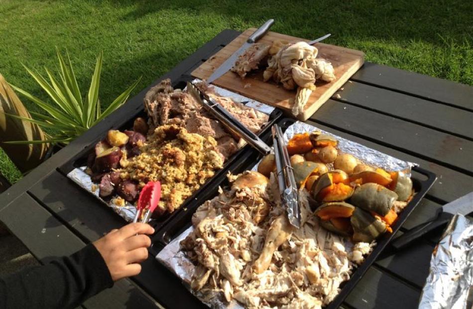 The finished product. A fine hangi feast is laid out for visitors.