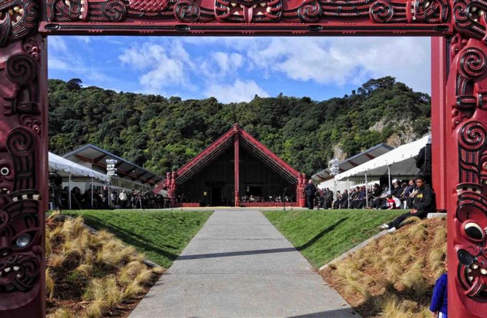 The Mataatua wharenui from the carved entrance to the marae.