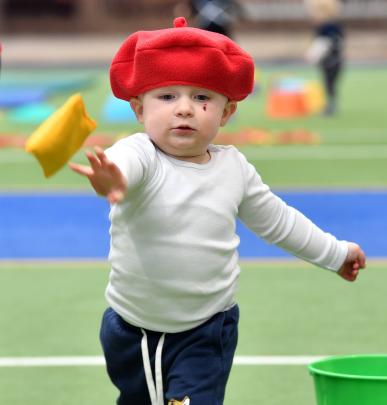 Liam Earnshaw, 2, shows good technique in the shot put competition during yesterday’s mini...