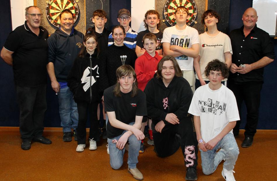 South Otago Darts Association members including Barry Gooch (second from left) are more than...