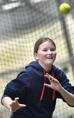 Ava Boyd, 11, keeps an eye on the ball.