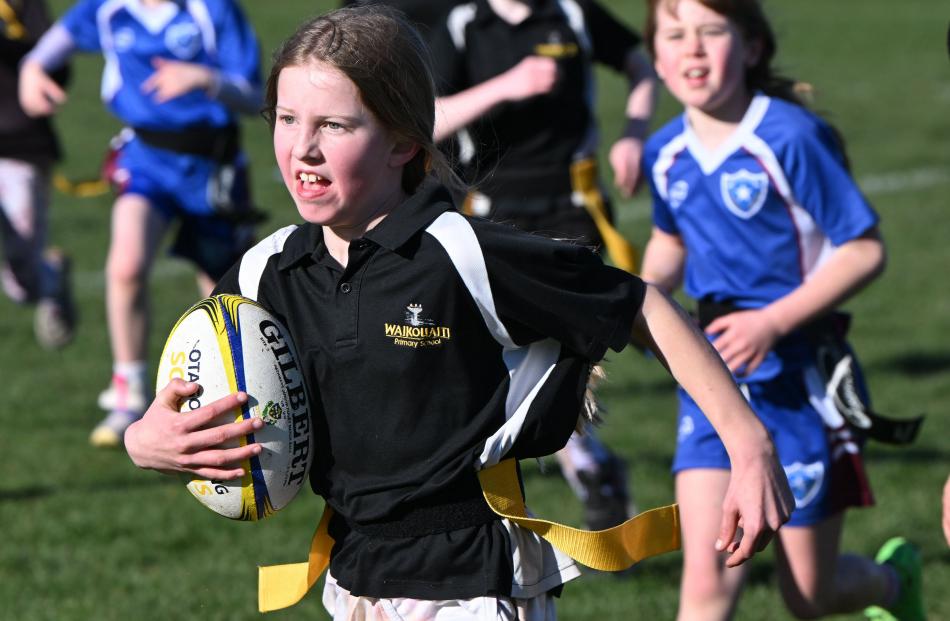 Chloe Hore, 9, of Waikouaiti School, has the tryline in sight.