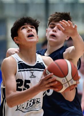 Otago Boys’ High School basketballer Tane Panirau looks for his shot while St Andrew’s College...