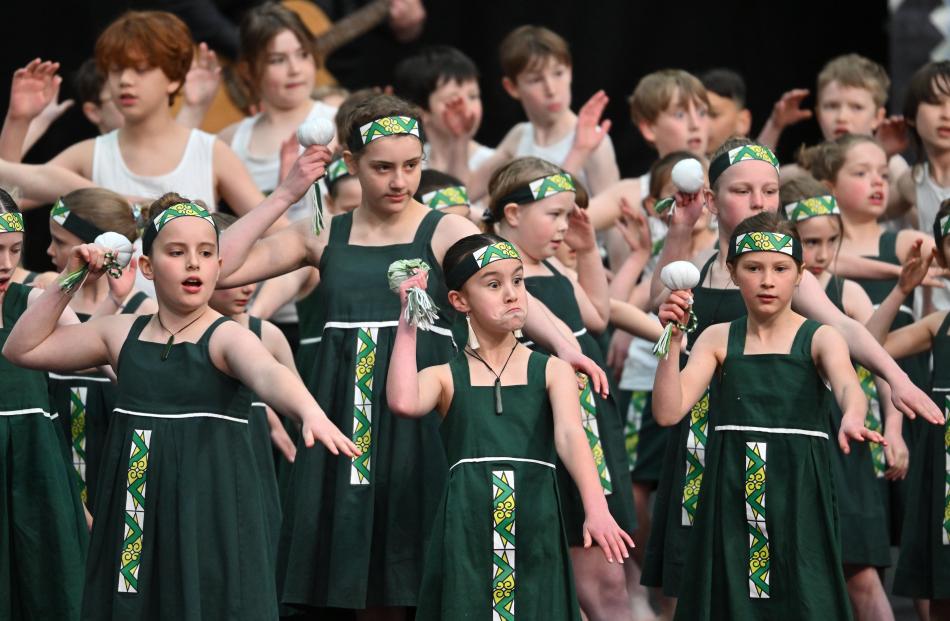 Pupils from Wakari School swing their poi.