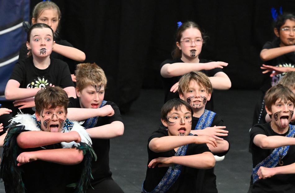 Wide-eyed Maori Hill School pupils perform for the crowd.