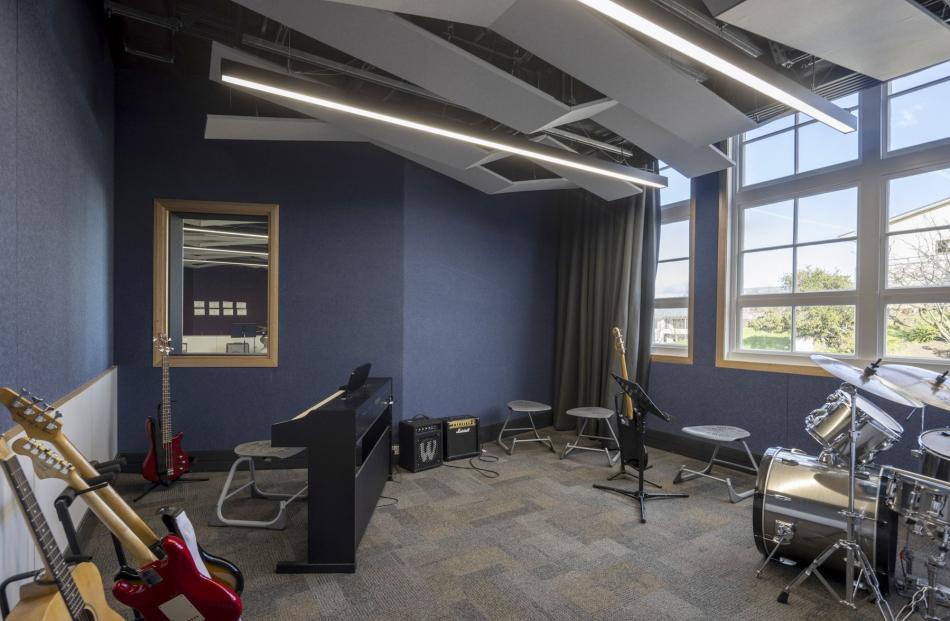 The two music levels include practice rooms, classrooms and a recording studio.