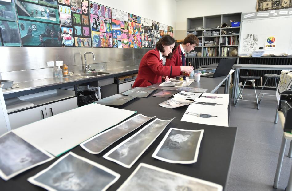 Misha Peyroux ,17, and Tom Davis, 18, work on their year 13 art portfolios in one of the new art...