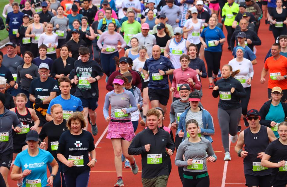 Steady as you go ... Runners get into their stride at the start of the 10km run. PHOTO: SIMON...