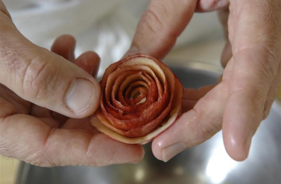 To make an apple or tomato peel rose for decoration: If you have a strip of apple peel, you can...