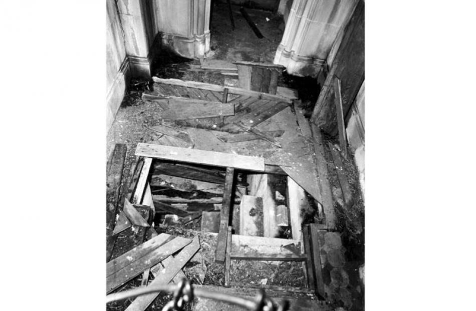 A 1972 photograph showing the desecration: the remains of the original herringbone-patterned...