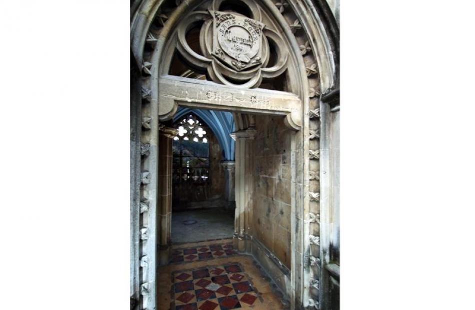 The doors have long been vandalised and Eliza Jane Guise Larnach's name and dates on the door...