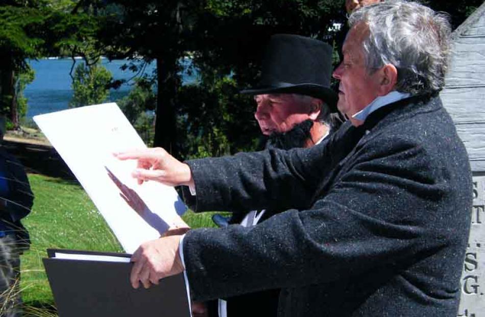 Broadcaster Dougal Stevenson (right) presents Queenstown Lakes Deputy Mayor John S Wilson with a...