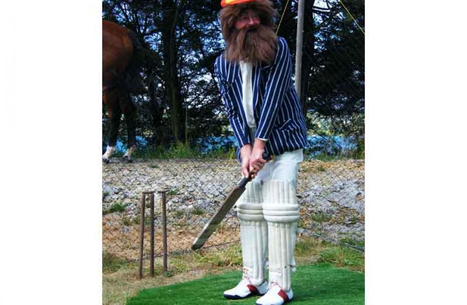 John Cushen, of Queenstown, demonstrates Victorian-era cricket dressed as cricket legend Dr...