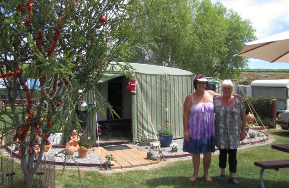 Bannockburn Domain camping ground caretaker Jane Scott (right) and ''Millionaires Mile'' camper...