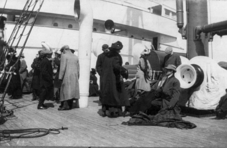 A group of survivors of the Titanic disaster aboard the Carpathia after being rescued, April 1912...