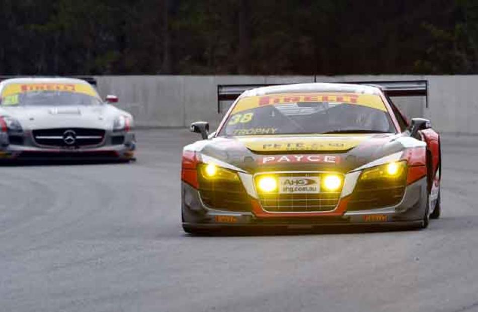 Australian GT cars negotiate the fast and tricky Southern Loop during running of the Highlands...