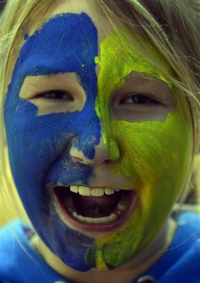 Emily Peacock (11), of Dunedin, shows her support for the Nuggets during Sunday's 95-66 win over...