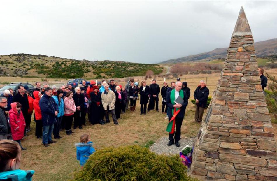 Fr Michael Dooley leads a service marking 70 years since the crash.