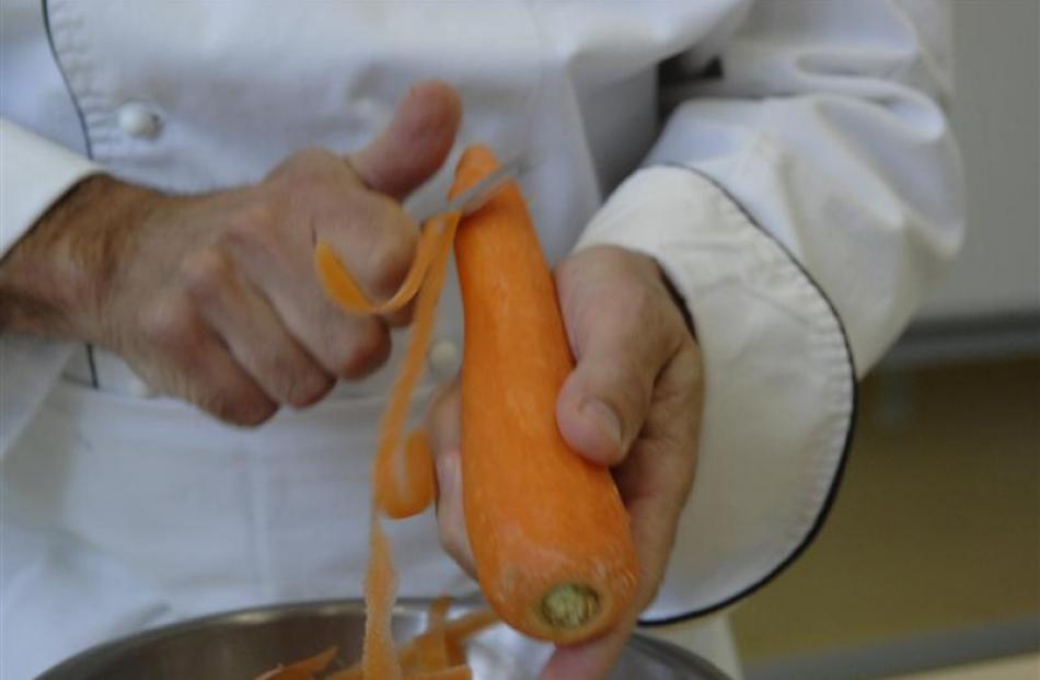 1. Peel the vegetable. It's easiest to peel a carrot before topping and tailing it. Photos by...