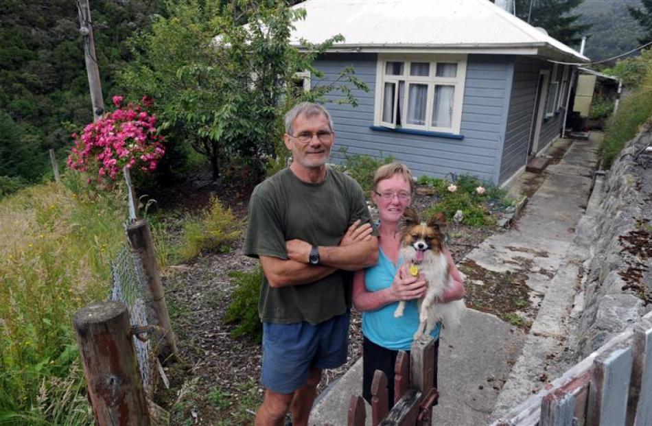 Jon and Lynette Barfoot, of Christchurch, and Papillon dog Jack Sparrow at their Waipori Falls...