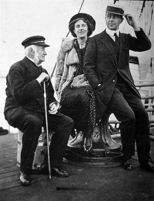 Kathleen and Robert Falcon Scott aboard  Terra Nova, with Clements Markham, of the Royal...