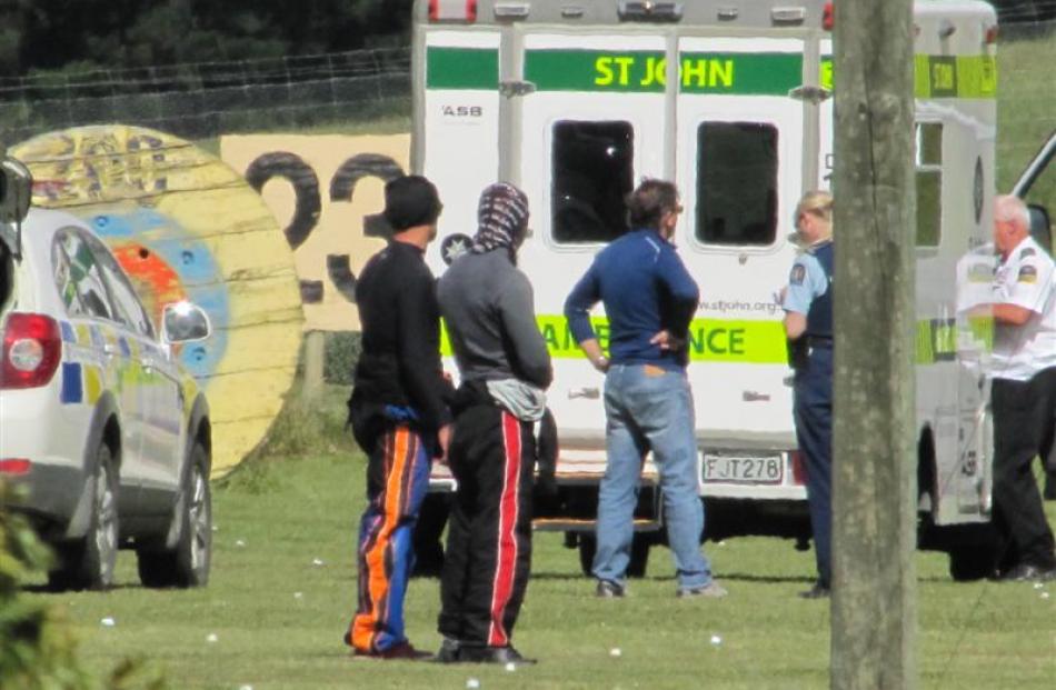 Police and ambulance staff at the scene of a skydiving fatality near Wanaka Airport yesterday...