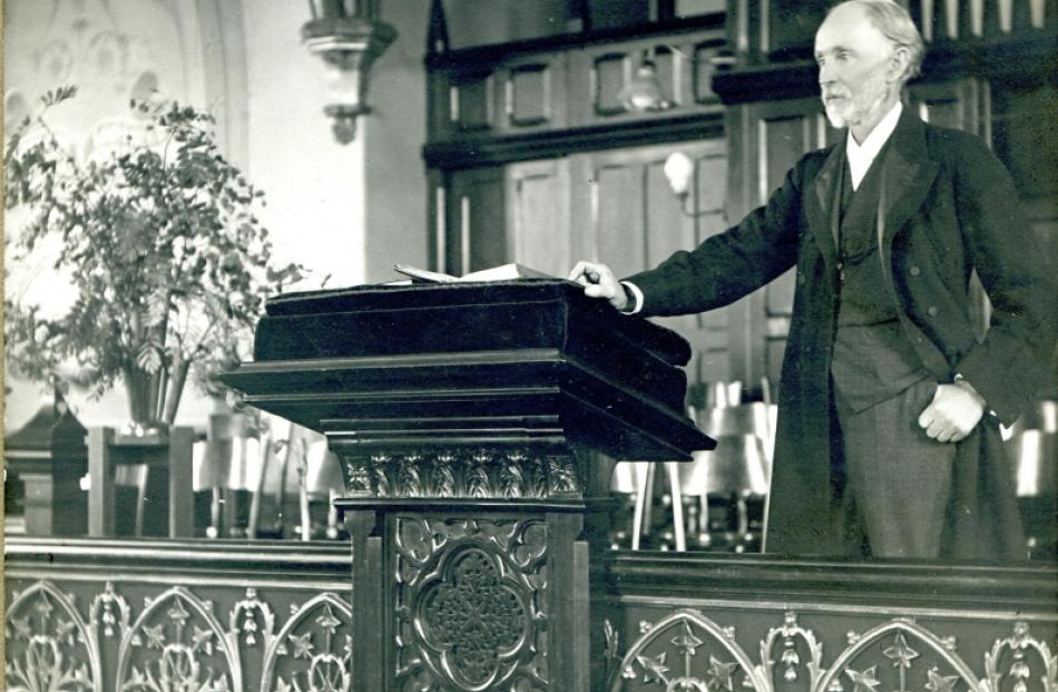 Rutherford Waddell stands at the pulpit of St Andrew's Presbyterian Church, Walker St, Dunedin,...