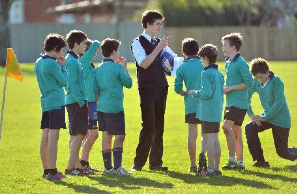 Taieri College pupil  and East Taieri Primary School rugby team coach Christian Henderson (16)...