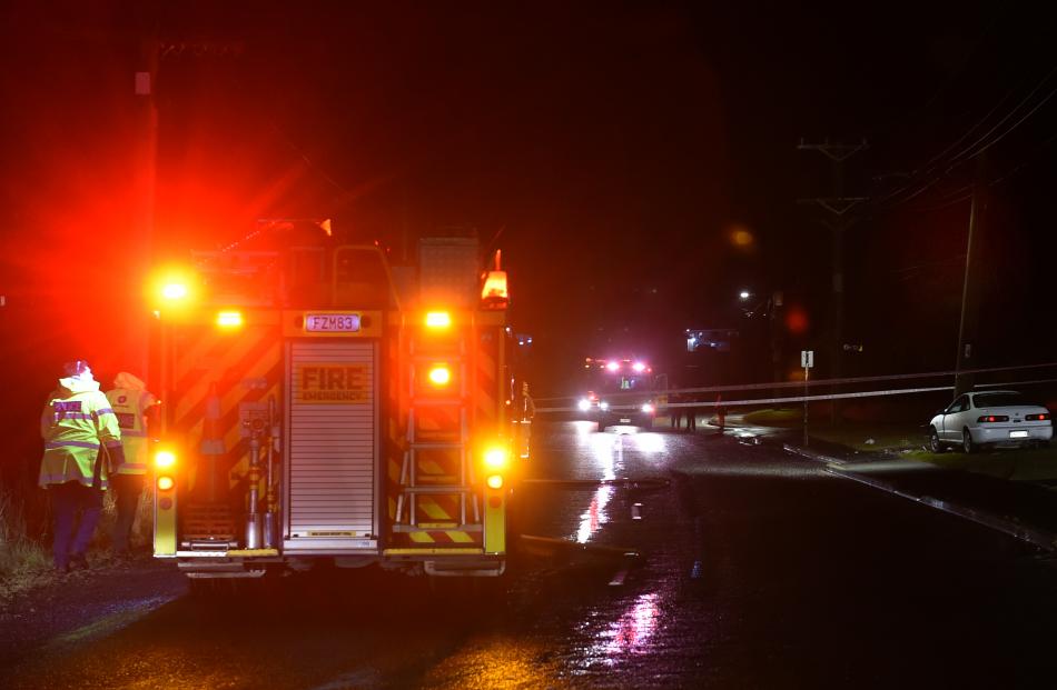 Emergency services at the scene of the crash. Photo: Peter McIntosh