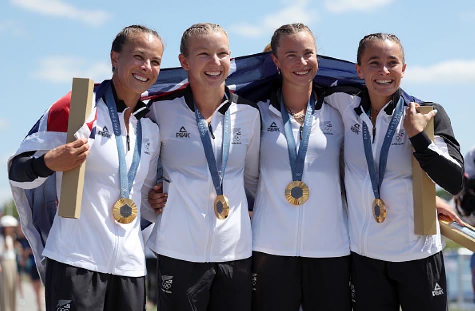 Lisa Carrington, Alicia Hoskin, Olivia Brett and Tara Vaughan with their gold medals after...