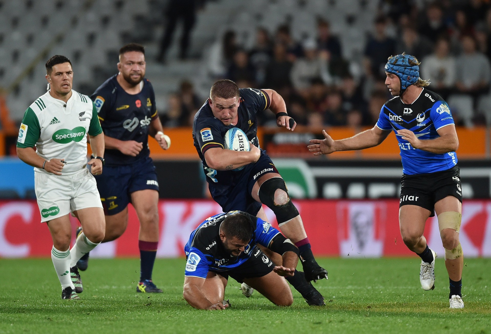 Highlanders prop Ethan de Groot bulldozes his way over his Force counterpart Santiago Medrano at...