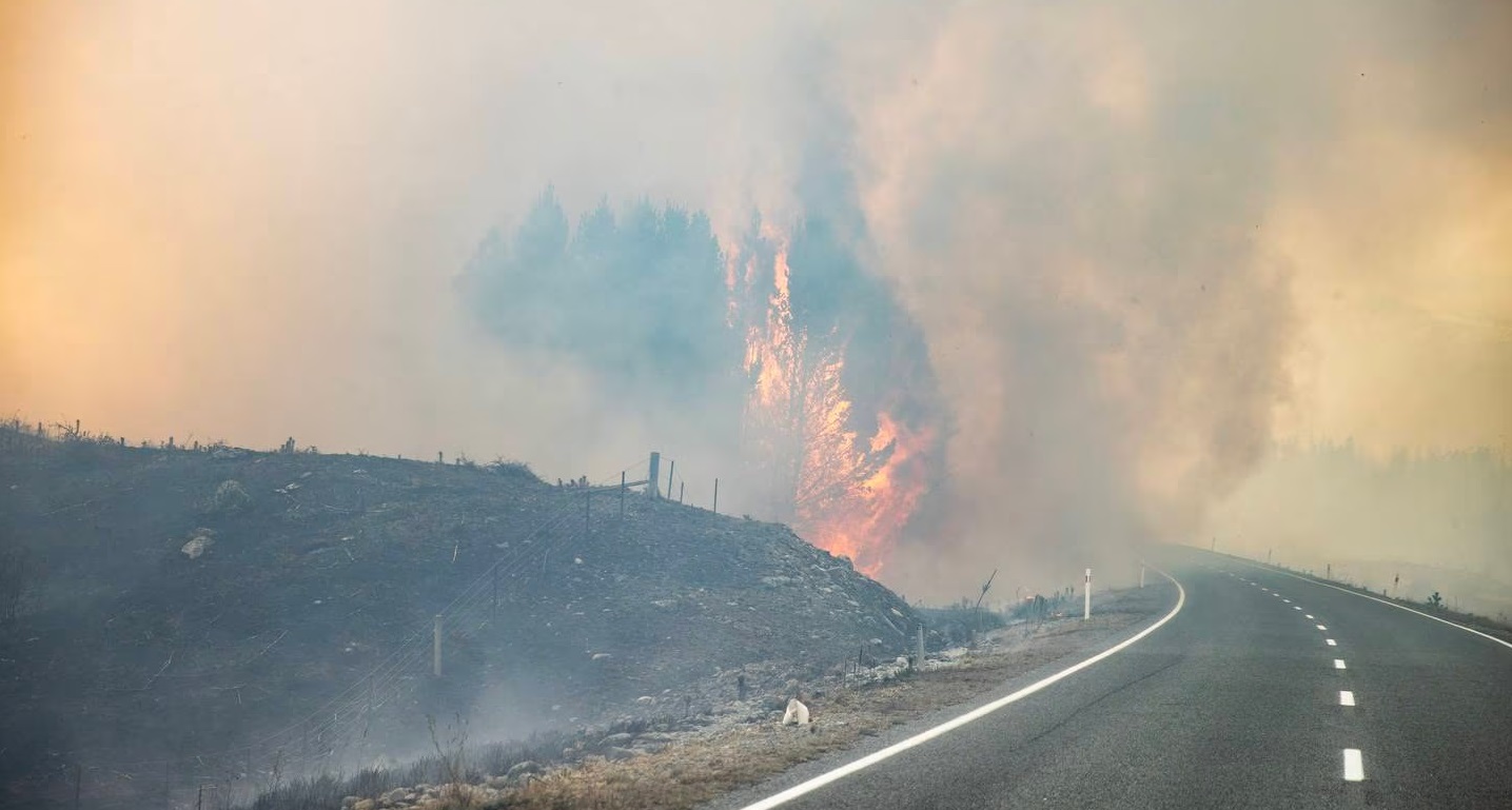 The fire is still burning alongside State Highway 80, but by this afternoon had been largely...